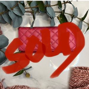 PRADA QUILTED SAFFIANO WALLET